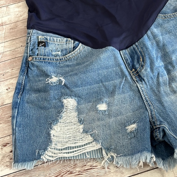 Pinkblush Medium Wash Distressed Fringe Hem
Maternity Full Panel Jean Shorts - Picture 5 of 11